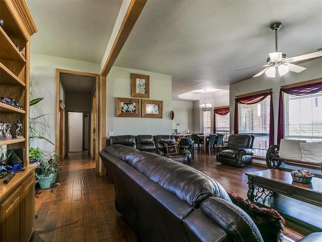 9315 Fendrych Dr, Oklahoma City, OK 73165 - living area featuring dark wood-style floors, a chandelier, and ceiling fan