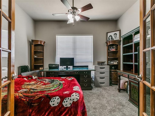 9315 Fendrych Dr, Oklahoma City, OK 73165 - carpeted bedroom with an office area and a ceiling fan