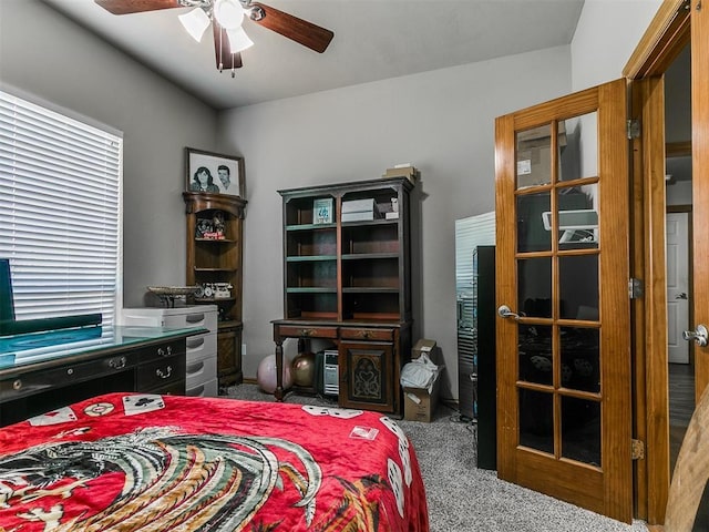 9315 Fendrych Dr, Oklahoma City, OK 73165 - carpeted bedroom with a ceiling fan