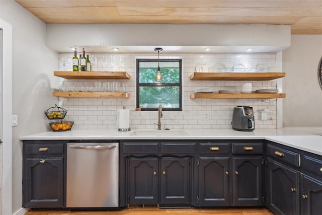 kitchen with dishwasher, a sink, open shelves, and backsplash