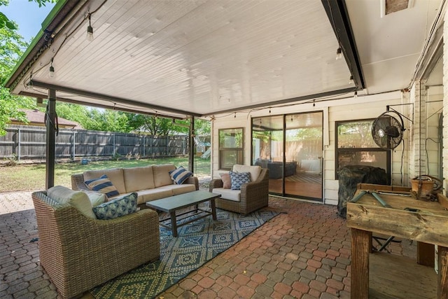 sunroom / solarium with an outdoor hangout area