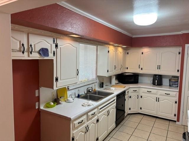 405 W Choctaw St, Lindsay, OK 73052 - kitchen with a sink, black appliances, white cabinets, light countertops, and ornamental molding