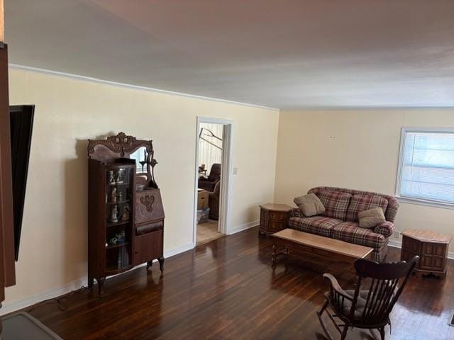 405 W Choctaw St, Lindsay, OK 73052 - living area with wood finished floors and baseboards
