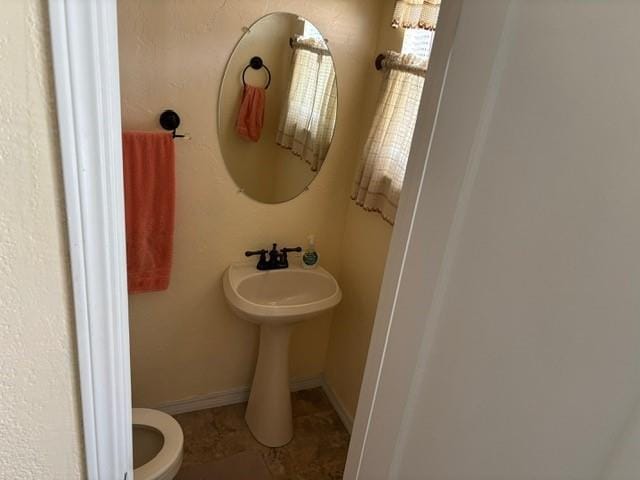 405 W Choctaw St, Lindsay, OK 73052 - bathroom featuring toilet