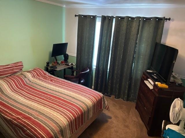 405 W Choctaw St, Lindsay, OK 73052 - carpeted bedroom featuring crown molding