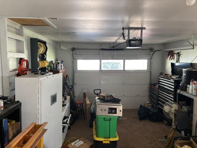 405 W Choctaw St, Lindsay, OK 73052 - garage with a garage door opener