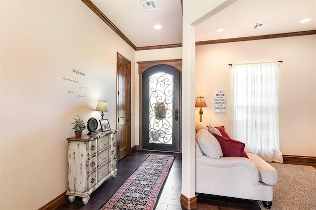 entrance foyer with healthy amount of natural light, ornamental molding, baseboards, dark wood-style flooring, and recessed lighting