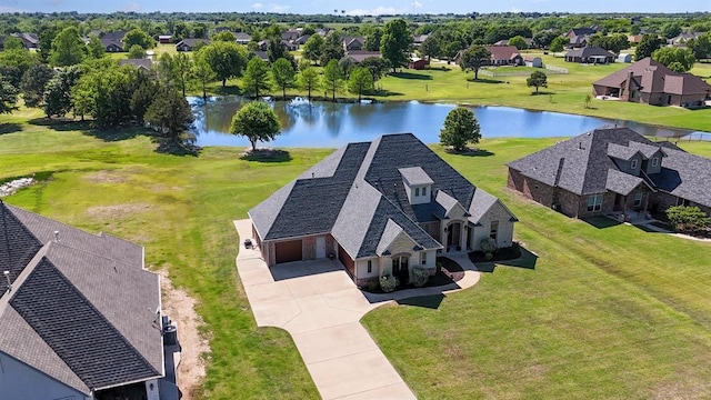 aerial perspective of suburban area with a large body of water