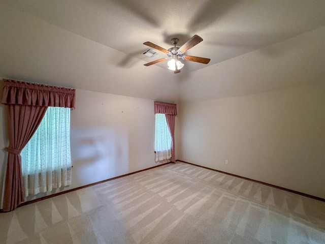 3424 Teton Ct, Norman, OK 73072 - empty room featuring ceiling fan, light carpet, baseboards, and lofted ceiling