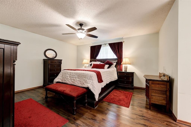 5708 NW 87th St, Oklahoma City, OK 73132 - bedroom featuring wood finished floors, a textured ceiling, baseboards, and ceiling fan