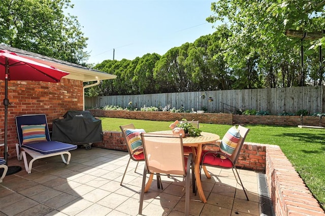 5708 NW 87th St, Oklahoma City, OK 73132 - view of patio featuring area for grilling and outdoor dining area