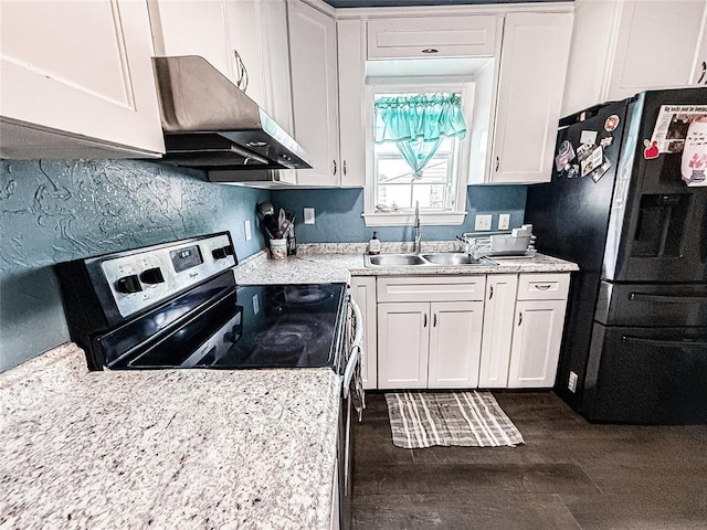 206 N Donald Ave, El Reno, OK 73036 - kitchen with stainless steel appliances, a sink, under cabinet range hood, and white cabinets