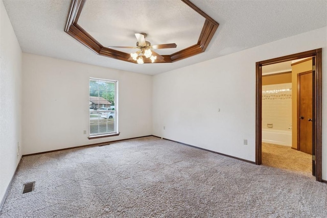 1104 Cedar Hill Pl, Oklahoma City, OK 73110 - carpeted empty room with a ceiling fan, a textured ceiling, a raised ceiling, and baseboards