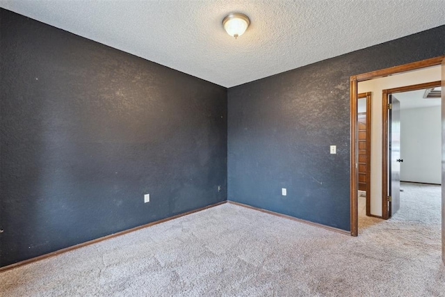 1104 Cedar Hill Pl, Oklahoma City, OK 73110 - carpeted empty room with a textured ceiling and baseboards