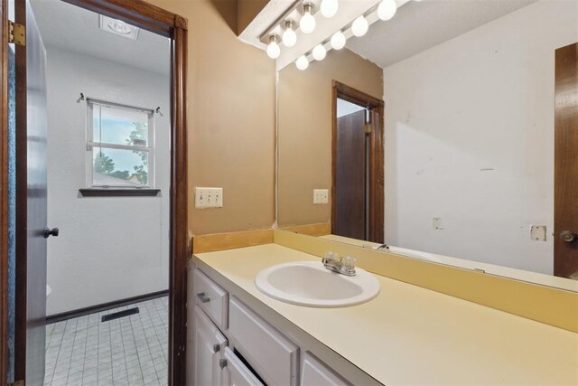1104 Cedar Hill Pl, Oklahoma City, OK 73110 - bathroom with vanity and tile patterned floors