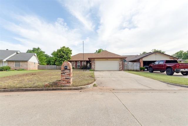 1104 Cedar Hill Pl, Oklahoma City, OK 73110 - view of front of property featuring a garage and concrete driveway