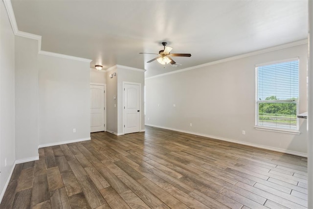 8345 NW 137th St, Oklahoma City, OK 73142 - empty room featuring a ceiling fan, wood finished floors, baseboards, and ornamental molding