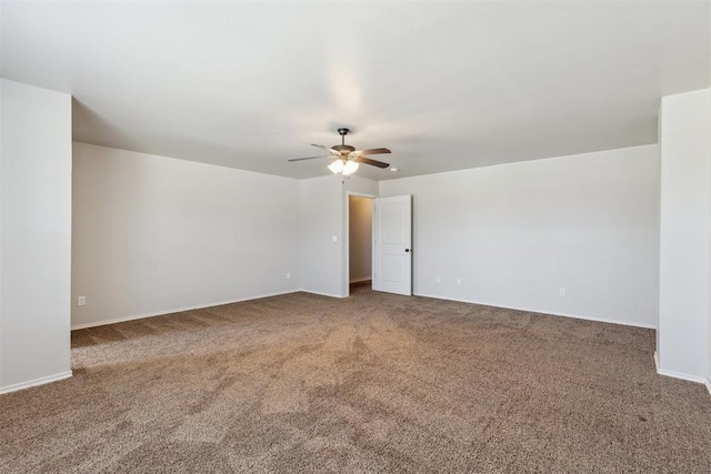 8345 NW 137th St, Oklahoma City, OK 73142 - carpeted empty room with ceiling fan and baseboards