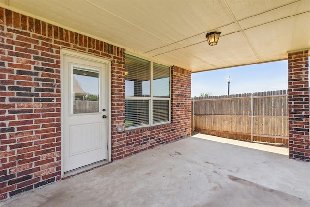 8345 NW 137th St, Oklahoma City, OK 73142 - view of patio featuring fence