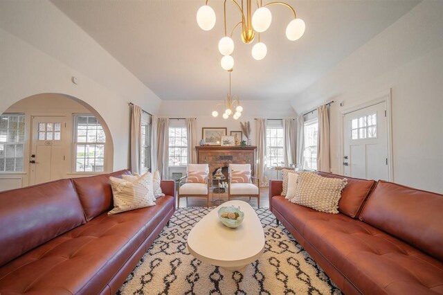 1017 Dean Pl, Oklahoma City, OK 73117 - living room featuring a chandelier and arched walkways