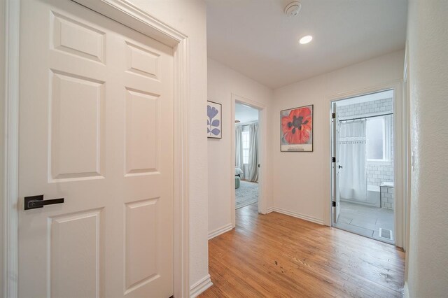 1017 Dean Pl, Oklahoma City, OK 73117 - corridor featuring light wood-style floors, baseboards, and recessed lighting