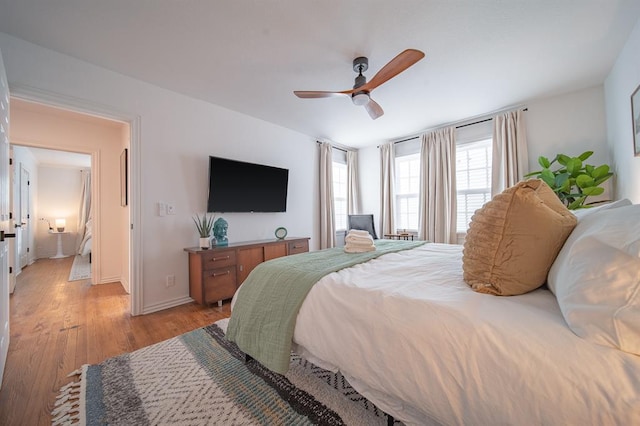 1017 Dean Pl, Oklahoma City, OK 73117 - bedroom featuring light wood finished floors, baseboards, and a ceiling fan