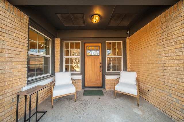 1017 Dean Pl, Oklahoma City, OK 73117 - view of exterior entry with covered porch and brick siding