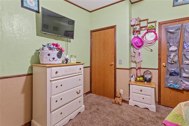 carpeted bedroom with ornamental molding