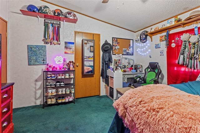 carpeted bedroom with ornamental molding, vaulted ceiling, a textured ceiling, and ceiling fan