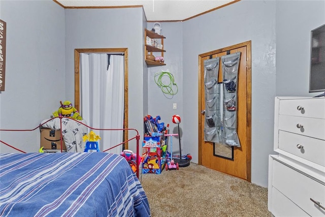 bedroom with carpet flooring and ornamental molding