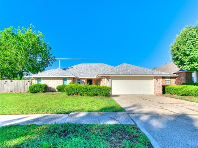 3605 Country Clb, Moore, OK 73160 - view of front facade featuring an attached garage, driveway, and brick siding