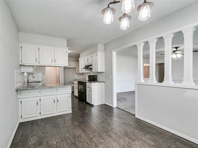 3605 Country Clb, Moore, OK 73160 - kitchen featuring black electric range oven, white cabinetry, a sink, dark wood finished floors, and light stone counters