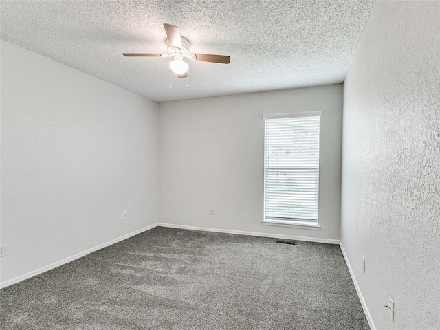 3605 Country Clb, Moore, OK 73160 - unfurnished room featuring a ceiling fan, carpet floors, a textured ceiling, baseboards, and a textured wall