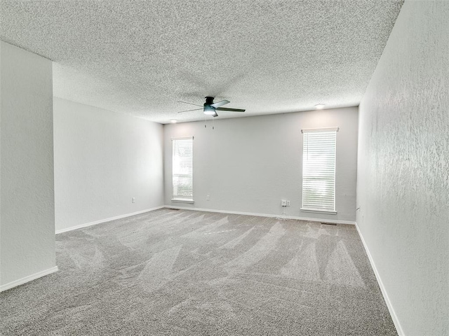3605 Country Clb, Moore, OK 73160 - carpeted empty room with a textured wall, ceiling fan, a textured ceiling, and baseboards