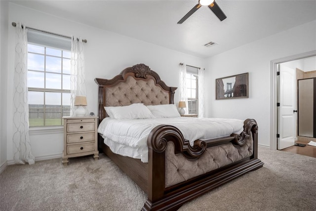 271 Taylam Rd, Goldsby, OK 73093 - carpeted bedroom with baseboards and a ceiling fan