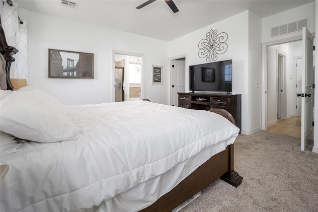271 Taylam Rd, Goldsby, OK 73093 - bedroom featuring carpet flooring, a ceiling fan, and ensuite bathroom