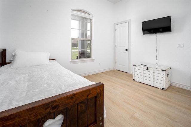 271 Taylam Rd, Goldsby, OK 73093 - bedroom with light wood-style floors and baseboards