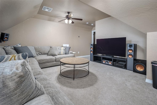 271 Taylam Rd, Goldsby, OK 73093 - carpeted living area featuring lofted ceiling, a textured ceiling, ceiling fan, and baseboards
