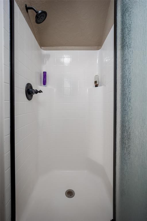 271 Taylam Rd, Goldsby, OK 73093 - full bath featuring a shower stall