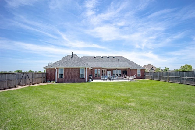 271 Taylam Rd, Goldsby, OK 73093 - rear view of property featuring brick siding and a patio