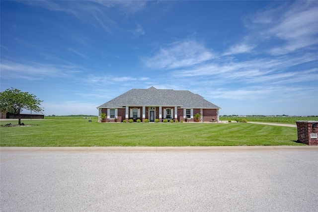 271 Taylam Rd, Goldsby, OK 73093 - single story home featuring a front yard and brick siding