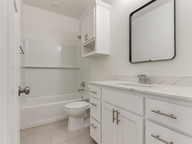 full bath featuring toilet, tile patterned floors, vanity, and bathing tub / shower combination