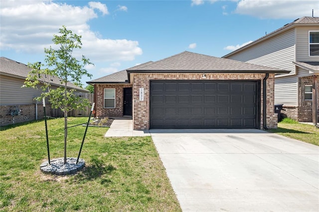 1837 Easton Ln, Oklahoma City, OK 73127 - view of front of property featuring brick siding, concrete driveway, an attached garage, a front yard, and a shingled roof