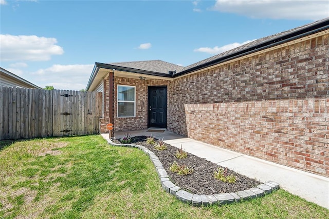 1837 Easton Ln, Oklahoma City, OK 73127 - doorway to property featuring brick siding and a gate