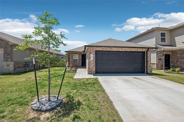 1837 Easton Ln, Oklahoma City, OK 73127 - view of front of home with a garage, driveway, brick siding, a front yard, and a shingled roof