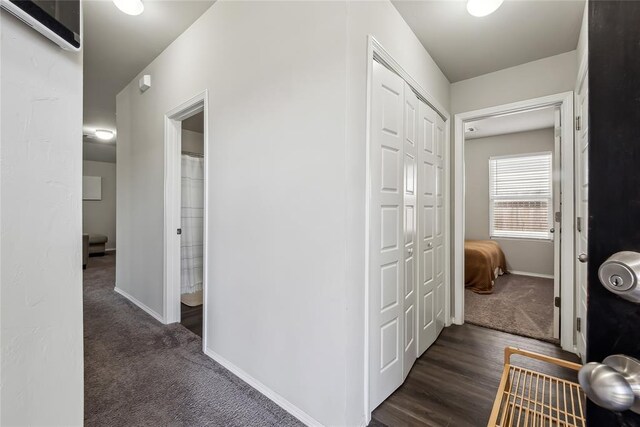 1837 Easton Ln, Oklahoma City, OK 73127 - corridor featuring baseboards and dark carpet