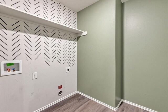 11700 NW 95th St, Yukon, OK 73099 - washroom featuring electric dryer hookup, washer hookup, wood finished floors, and baseboards