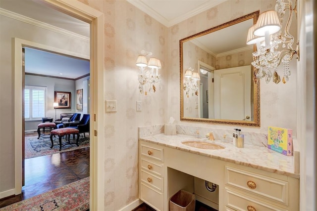 1114 Sherwood Ln Unit B-2, Nichols Hills, OK 73116 - bathroom with baseboards, wallpapered walls, vanity, crown molding, and a chandelier