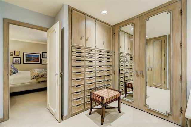 1114 Sherwood Ln Unit B-2, Nichols Hills, OK 73116 - wine cellar with ornamental molding, light colored carpet, and recessed lighting