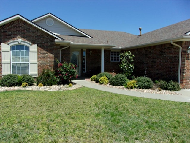 1926 E Aspen Pl, Shawnee, OK 74804 - single story home featuring brick siding and a front yard
